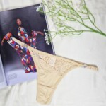 Tanga Fio Dental com Biju e Elástico Franzido